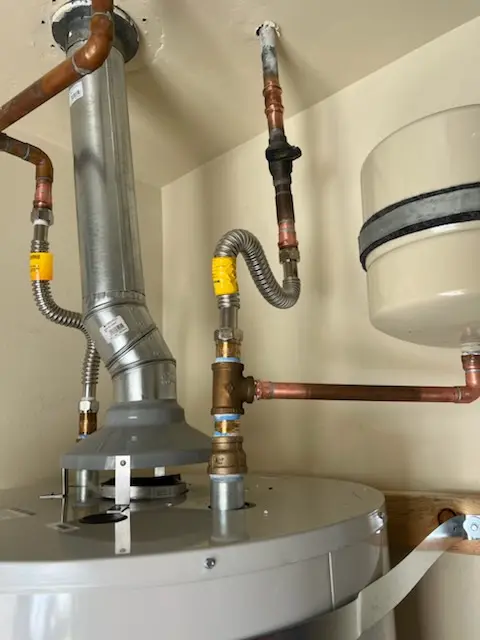 Water heater installation and plumbing repair in Forestdale